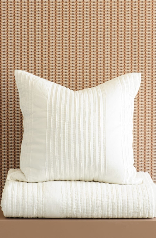 Puritsu ivory bedspread and eurosham stack